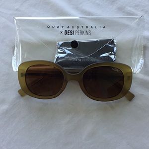 Quay light brown stylish sunglasses.